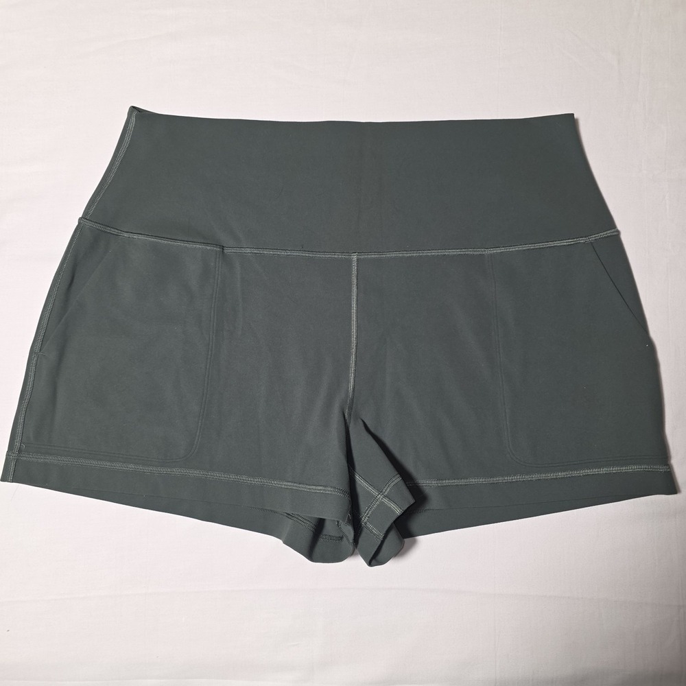 Lululemon Size 12 Green High Rise Biker Shorts Side Pockets Athletic Workout